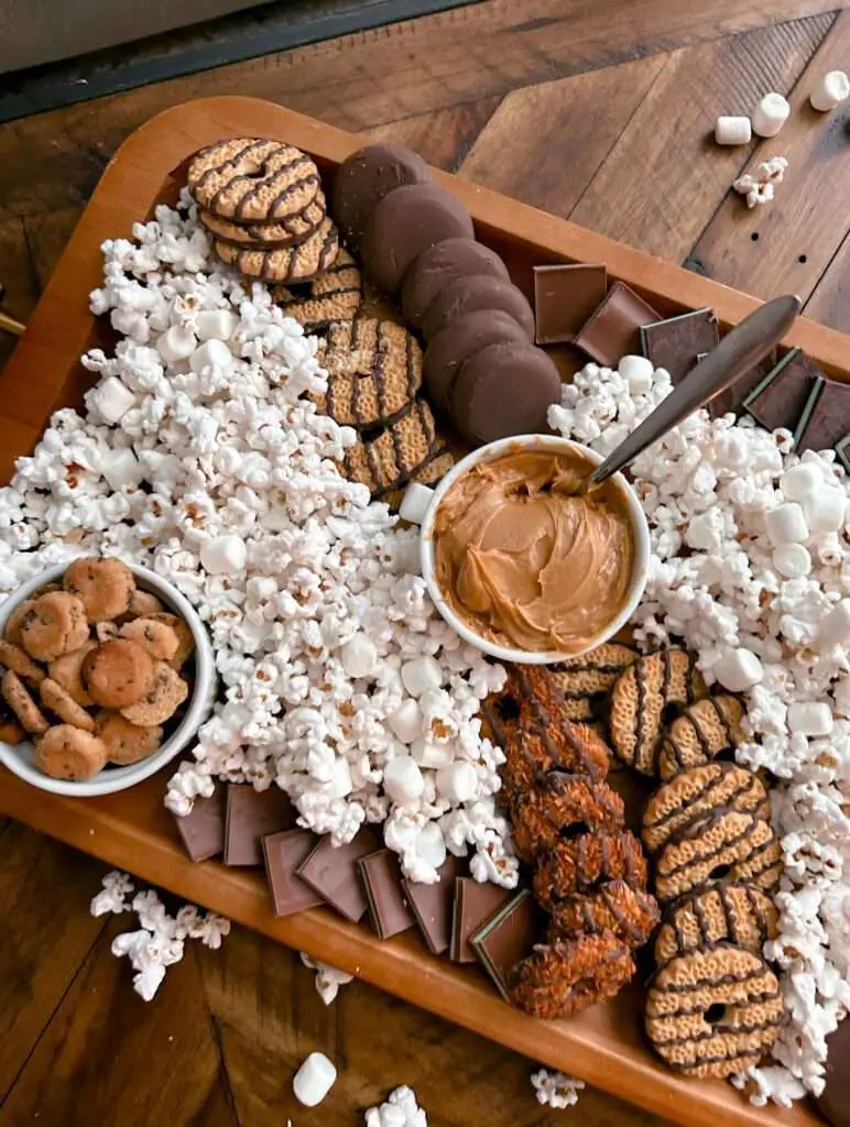 Dessert charcuterie board with popcorn.